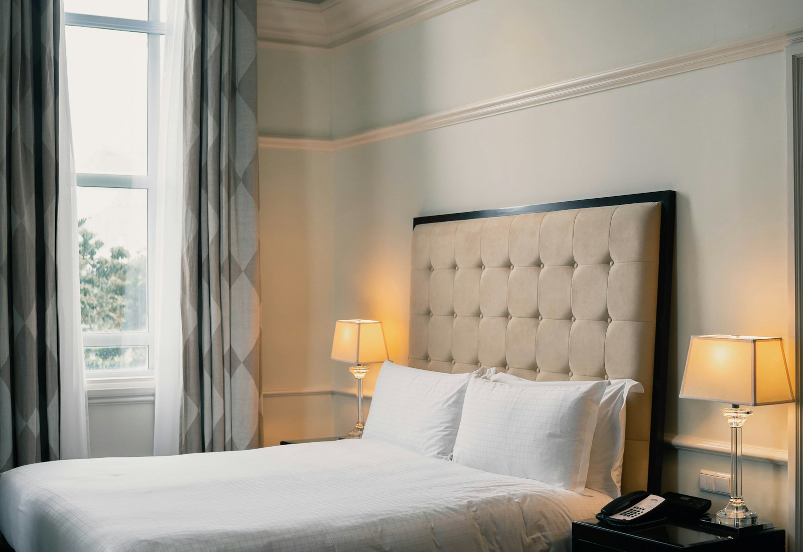 Deluxe Double room with a queen bed and soft linen